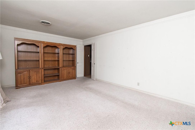 interior space with crown molding