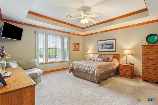 15938 Goliad Loop, Temple, TX 76502 - bedroom with a raised ceiling, ornamental molding, light colored carpet, and ceiling fan