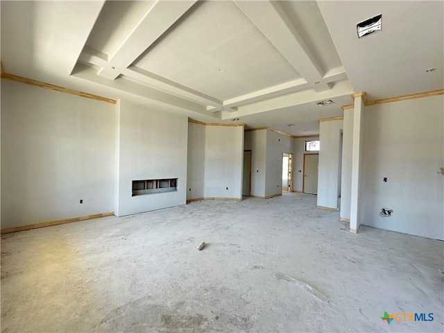 403 Magnolia Dr, Troy, TX 76579 - unfurnished living room featuring a fireplace, beam ceiling, and concrete floors