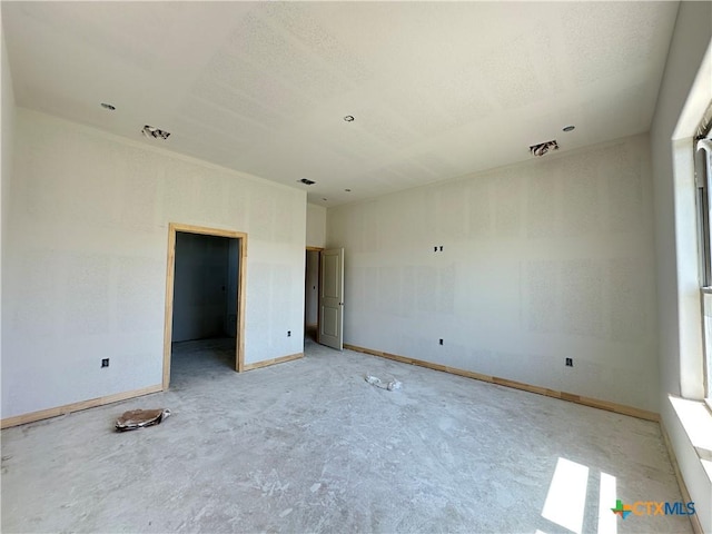 403 Magnolia Dr, Troy, TX 76579 - unfurnished bedroom featuring baseboards