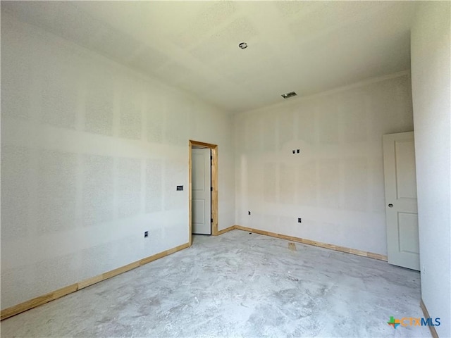 403 Magnolia Dr, Troy, TX 76579 - empty room featuring unfinished concrete floors and baseboards