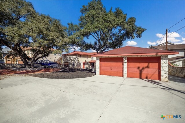 view of property exterior with a garage