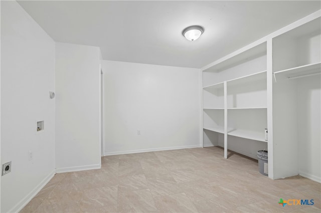 unfurnished bedroom featuring baseboards