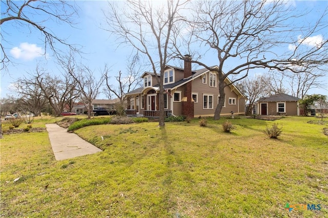 view of home's exterior featuring a chimney and a lawn