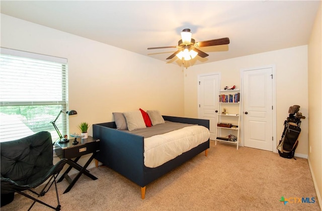 1729 Yturria Dr, Belton, TX 76513 - bedroom with light colored carpet and a ceiling fan