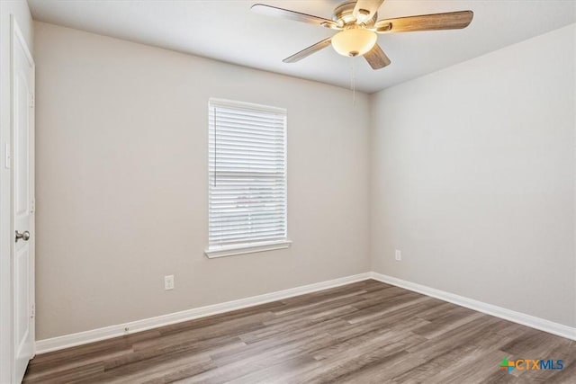 1202 Amber Dawn Dr, Temple, TX 76502 - unfurnished room featuring wood finished floors and a ceiling fan