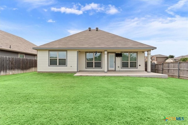1202 Amber Dawn Dr, Temple, TX 76502 - back of house featuring a patio area, a fenced backyard, and a shingled roof