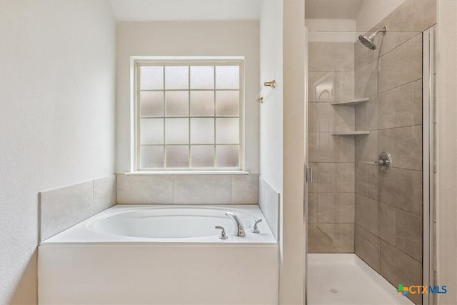 1202 Amber Dawn Dr, Temple, TX 76502 - full bath with a shower stall and a garden tub