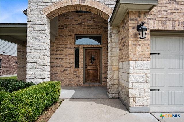 property entrance featuring a garage