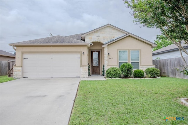 ranch-style house featuring stucco siding, fence, stone siding, concrete driveway, and an attached garage
