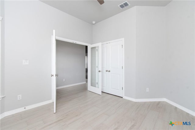 2904 Torino Reale Ave, Temple, TX 76502 - empty room featuring light wood finished floors, a ceiling fan, and baseboards