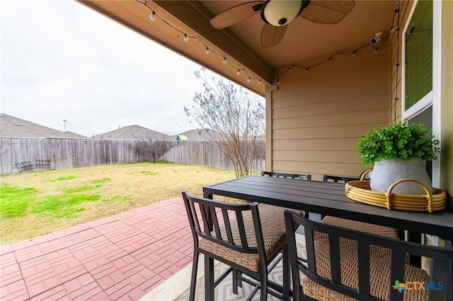 view of patio with ceiling fan