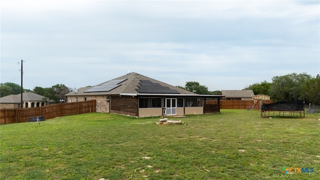 125 Savage Cir, Copperas Cove, TX 76522 - view of yard featuring a trampoline, a sunroom, and a playground