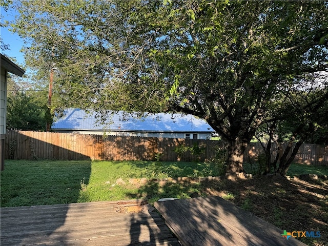 exterior space featuring a wooden deck