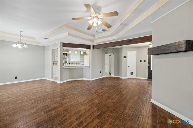 1008 Woodshadows Dr, Harker Heights, TX 76548 - unfurnished living room with a raised ceiling, ceiling fan, a chandelier, and wood finished floors