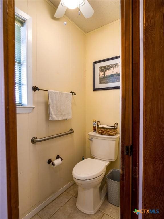 106 Flamingo Cir, Marble Falls, TX 78654 - bathroom with tile patterned flooring, toilet, ceiling fan, and baseboards