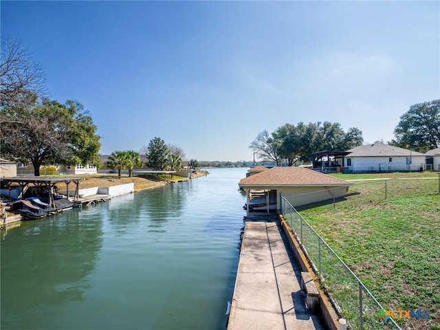 106 Flamingo Cir, Marble Falls, TX 78654 - dock area featuring a water view, fence, and boat lift
