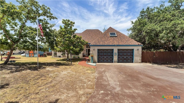 view of front of home with a front lawn