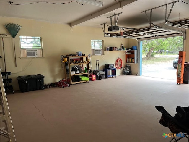 garage with a garage door opener and cooling unit