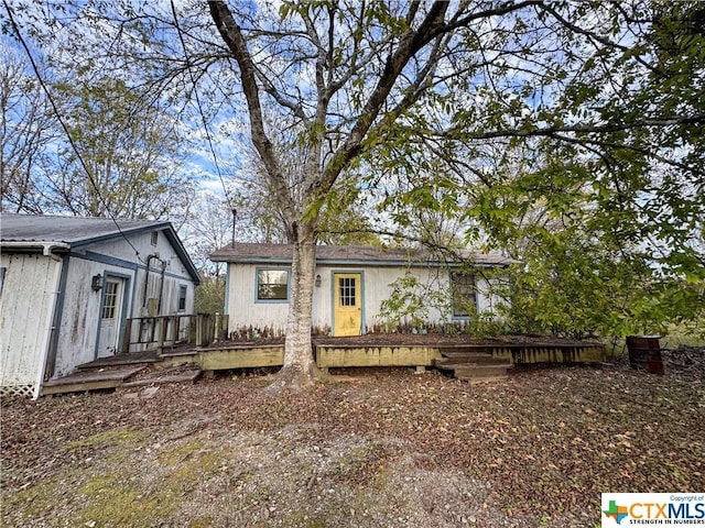 21 Anderson Ln, Coldspring, TX 77331 - rear view of property with a deck