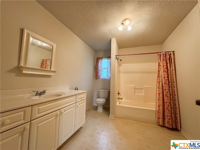 full bathroom featuring toilet, vanity, a textured ceiling, and shower / bathtub combination with curtain