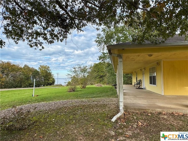 21 Anderson Ln, Coldspring, TX 77331 - view of green lawn with a patio area
