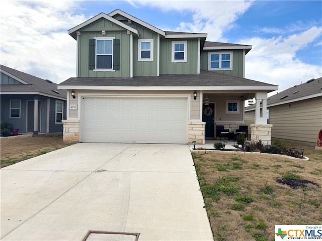 craftsman-style house featuring a garage