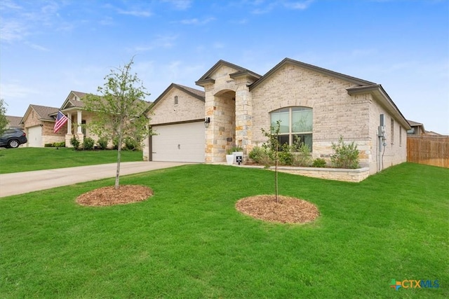 2407 Freddie L Nichols Sr Dr, Harker Heights, TX 76548 - french country home with concrete driveway, a garage, and stone siding