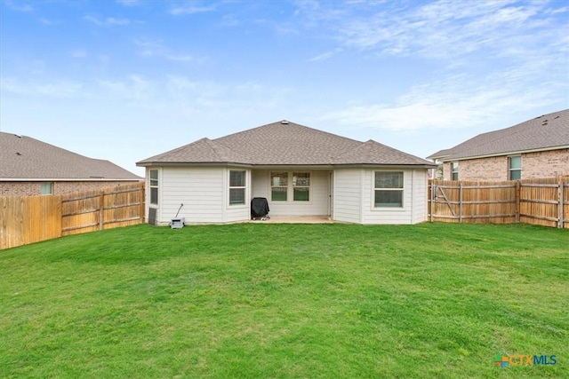 2407 Freddie L Nichols Sr Dr, Harker Heights, TX 76548 - back of house with a fenced backyard and a patio area