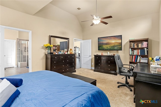 carpeted bedroom with ceiling fan, connected bathroom, and high vaulted ceiling