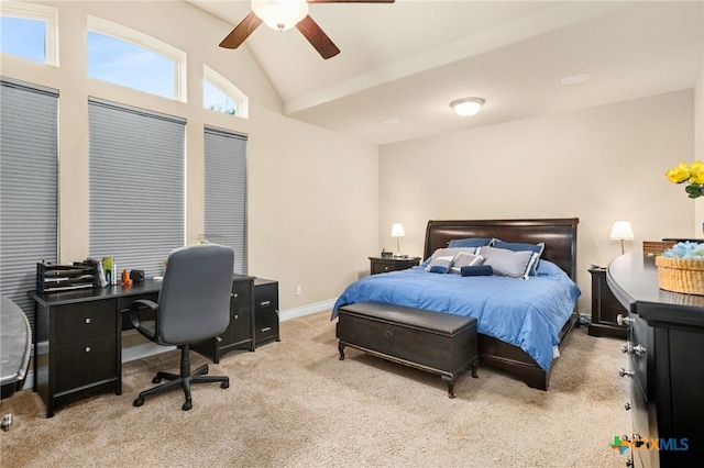 carpeted bedroom with lofted ceiling and ceiling fan