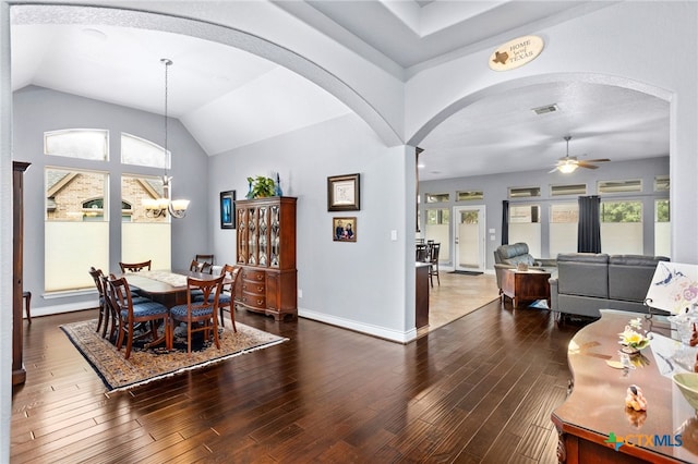 dining space with plenty of natural light and dark hardwood / wood-style floors