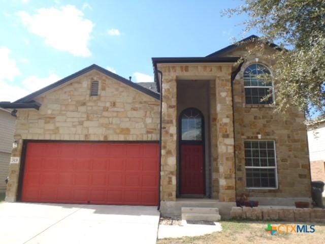 view of front of home featuring a garage