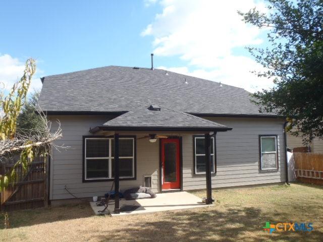 view of front of house featuring a patio area and a front yard