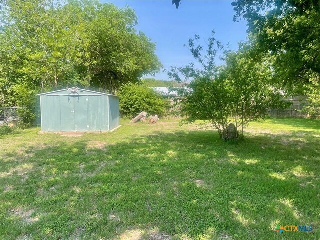 413 Vickers Ave, Seguin, TX 78155 - view of yard with a storage shed and an outbuilding