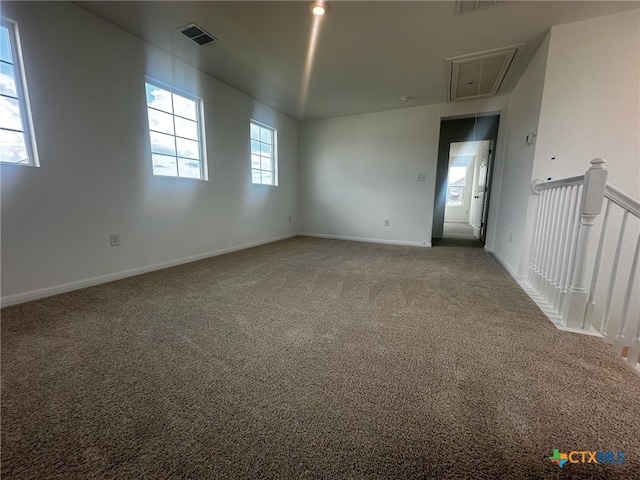 unfurnished room with carpet floors