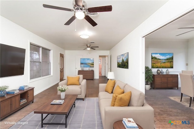 living room with ceiling fan