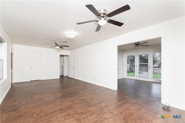 unfurnished room with dark hardwood / wood-style floors