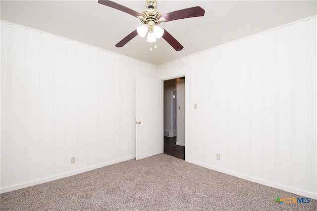 empty room featuring carpet flooring