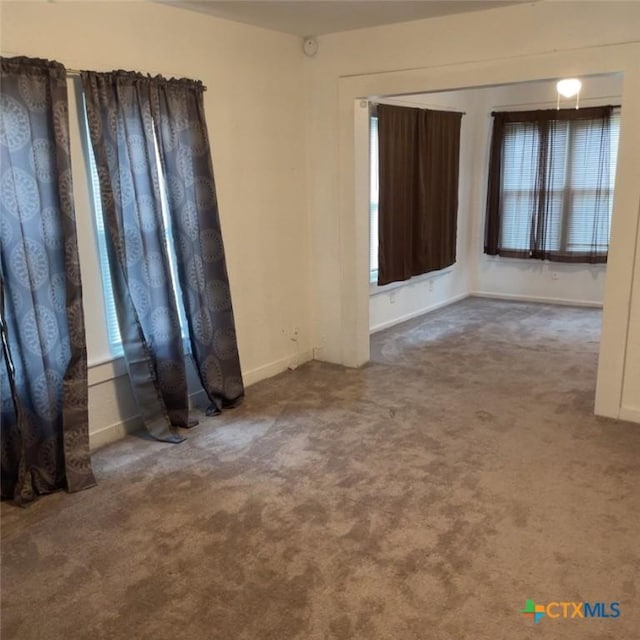 view of carpeted spare room