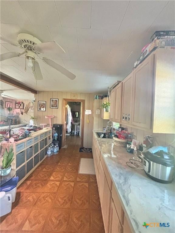 1208 W Adams St, Port Oconnor, TX 77982 - kitchen featuring a ceiling fan and light countertops