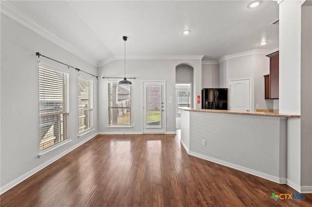 kitchen with dark hardwood / wood-style flooring, black fridge with ice dispenser, kitchen peninsula, and crown molding