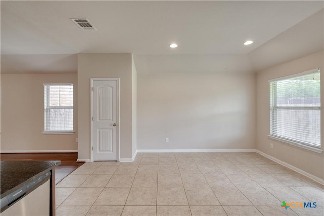 7400 Longford Trl, Austin, TX 78754 - spare room with recessed lighting and light tile patterned floors