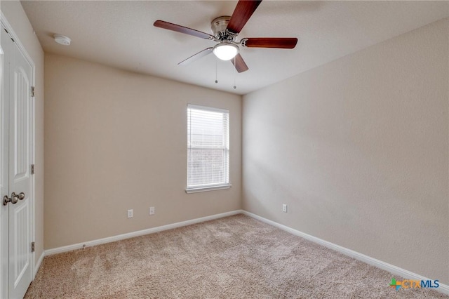 7400 Longford Trl, Austin, TX 78754 - carpeted spare room with a ceiling fan and a smoke detector