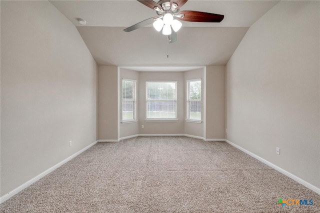 7400 Longford Trl, Austin, TX 78754 - carpeted spare room with ceiling fan, a smoke detector, and vaulted ceiling