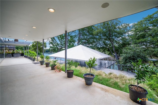 view of patio / terrace with a water view