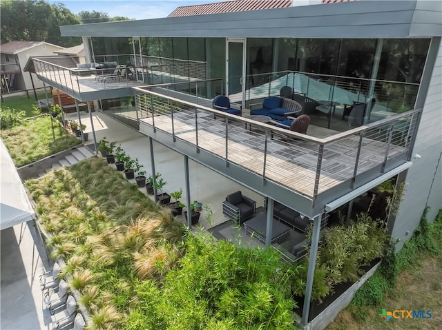 exterior space with outdoor lounge area