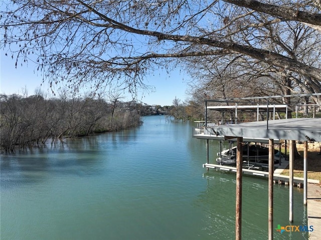 dock area featuring a water view