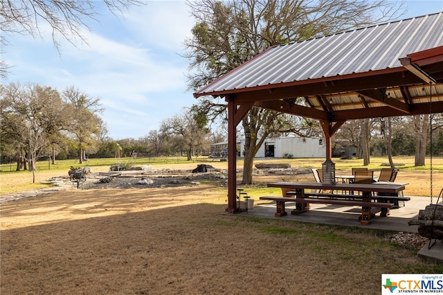 view of property's community featuring a gazebo and a yard