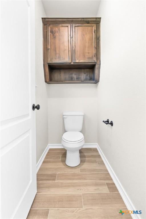 bathroom featuring toilet